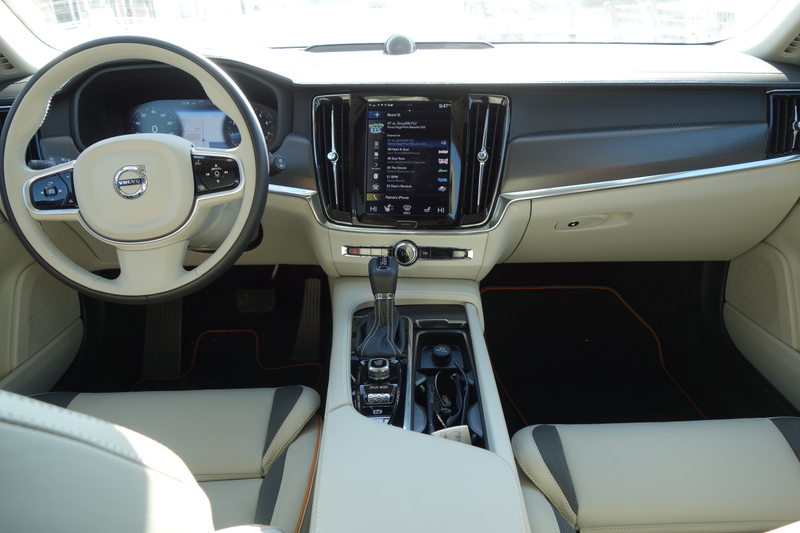 Illustration for article titled The Volvo V90 Cross Country Has Orange Seatbelts and a $3,300 Cargo Box and I Love It